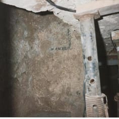 Guildford - Indigo pigment in corner of synagogue chamber