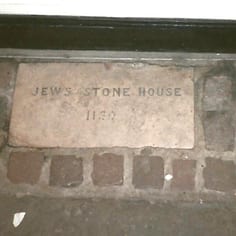 A plaque (incorrectly) recording the site of a medieval Jew's house identified by Adler in the 1930s, opposite the junction with Stour Street