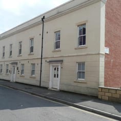 Site of Gloucester Jewish Cemetery recently redeveloped as Potter's Place, 20 Russell Street. The cemetery lies behind the terrace and to the right of picture. Some Jewish burials may still be in situ as skeletal remains were retained off the edge of the excavated area.