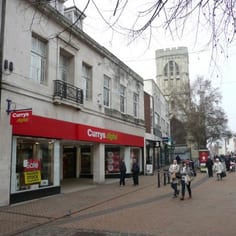 Eastgate and the tower of St Michael's Church - the sites of the Medieval Synagogue and Bonenfaunt's 'great house', which was probably just in front and Jews Court (Curia) (site of Curry's and 3 Store)