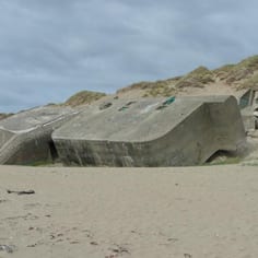 Fallen Block Houses on Hardelot Beach.  They were originally on the top of the dunes, but erosion has caused them to fall to the beach.