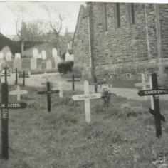 The Russian Cemetery at St Anne's Church after the war.  A photograph of 1952 shows this site without any grave-markers. The site was exhumed in 1961, though at least one burial appears to have been left at the back far-hand right of this picture on the corner next to the path.  Five additional graves of Dutch workers were also found and emptied at the front of the church.