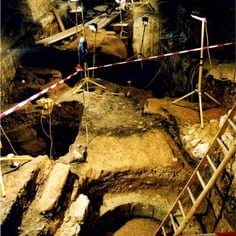 The Milk Street Mikveh, in situ, duriing excavation (located at base of ladder in fore-ground)