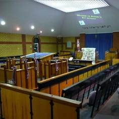 The interior of modern Richmond Synagogue decorated for a Batmitzvah