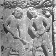 West Front Frieze (Map, no. 1) - The labours of Adam and Eve showing Adam and Cain tilling the ground and the hand of God reaching down with a bag with a gift of seeds or perfume--a motif taken from Jewish tradition.  This panel was covered for restoration at the time of writing.
