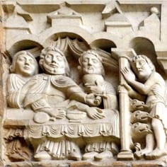 West Front Frieze (map, no. 1) - Feast of Dives and Lazarus and Death of Lazarus. in the medieval period Lazarus was held to represent the Jews, and, Dives the Christians.