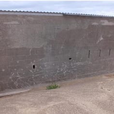 A possible execution site at the Gravel Works, Le Petit Val. The bullet craters still have some bullets embedded in them.