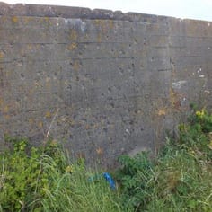 Possible execution site on the anti-tank wall, Longis Common.  Some of the skeletons exhumed from the nearby grave pit 'had holes in their heads'.