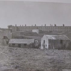 Watermill Farm with Fort Tourgis behind, the house of Frank Oselton on of the few Britons who stayed on during the occupation.