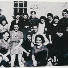 Lager Sylt: Algerian prostitutes pictured in Sylt Camp.  SS Rottenfuhrer Paulsen and a brutal war-criminal, is on the right (labelled as 'SS'). (Alderney Museum.