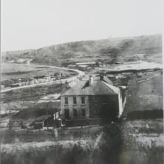 The site of the Jewish Camp at Newtown.  This is behind the houses identfied by JTrails, in the foreground, which may have been the billets for the Jewish prisoners.  These next to 'Peacehaven' a former German hut which has a Star of David carved in the roof.