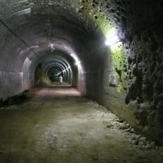 One of the great concrete galleries at Mimoyecques.  The V3 'super-gun' site employed many Jewish labourers, as well as political prisoners and volunteers and there was great loss of life following the 'Tallboy Raid'.