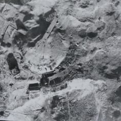 An Allied aerial image showing the Dome at La Coupole (Wizernes)in close-up, with evidence of bomb-craters all around.