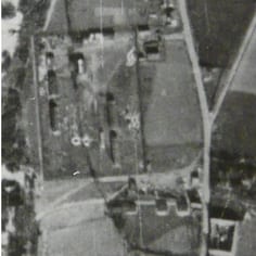 Lager Tibor shown in a war-time aerial image.  The main compound and huts can be seen with the Chemin du Facteur running through the middle.