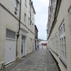Bedford Castle Lane, at the heart of the medieval Jewry of Bedford, between the market and the Castle and also the site of the Bedford Loan Company ran by the father of Bedford Jewish Olympian, Harold Abrahams (7-9 Castle Lane).