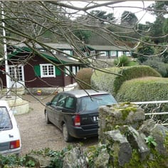 Site of OT Camp and Debau Canteen - Site 'B' on MI 19 Map, now 'Pine Springs.  The huts may be original huts from the OT Camp.