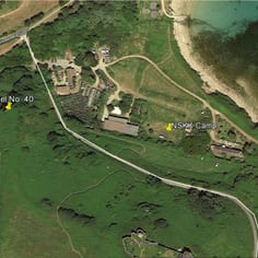 Site of an OT Camp taken over by NSKK (German Transport) near to Fort Essex Tunnel and construction site. The MI 19 reports states: 'All these huts are taken over by the OT. for drivers', indicating this had an earlier use as a camp.