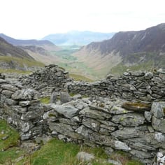 16th Century German Miner's Hut at 2,000 feet on Dale Head, looking towards Keswick.  This hut may have been home to Jewish miners working at the Dale Head Mine, just under the summit of the mountain.  Goldscope is at the end of the valley on the left.