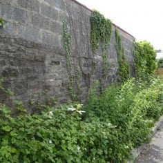 Surviving portion of the north wall of the second Merthyr Synagogue.  Merthyr Hebrew Congregation was founded in 1848, with the first synagogue in Bethesda Street, in 1848, with a second in 1852 off Church Street, adjacent to the Temperance Hall.