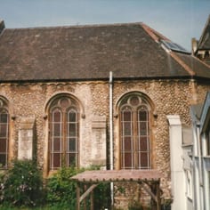 Chatham Synagogue exterior with modern extension and Sukkah